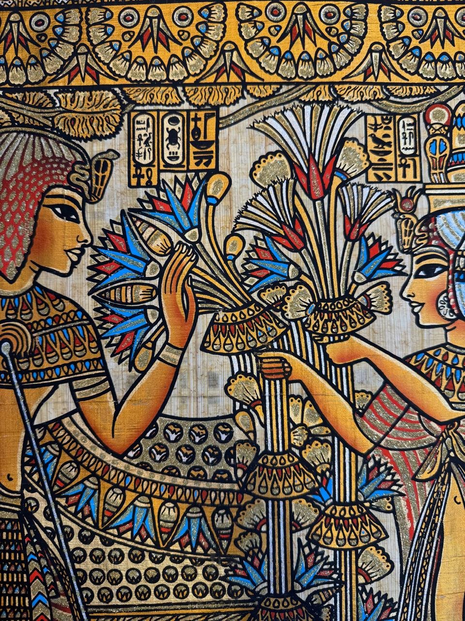 Pharaoh and Queen Offering Lotus and Papyrus Flowers