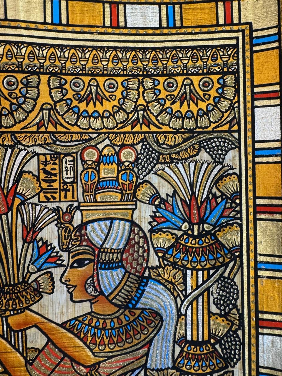 Pharaoh and Queen Offering Lotus and Papyrus Flowers